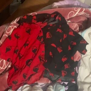 A women’s button down shirt from the brand Empyre it is a size small it is worn.